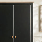 [Black] Haven 2 door wardrobe top corner, oak veneer crown sitting proud of the matte black frame.