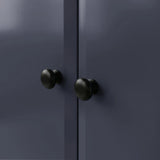 [Blue] Haven wardrobe knob close-up, two round black knobs on smooth blue painted door fronts