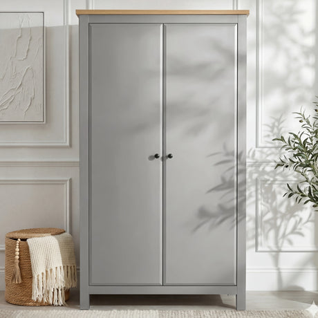 [Grey] Front of Haven wardrobe showing grey doors, oak top edge and round black knobs
