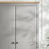 [Grey] Haven wardrobe close up, grey painted doors, oak top edge and round black knobs