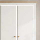 [White] Haven 2 door wardrobe close up of the oak top strip, white door fronts and round wooden knobs below