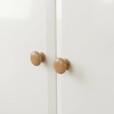 [White] Haven 2 door wardrobe knob detail, turned oak handles sitting centrally where the two white doors meet