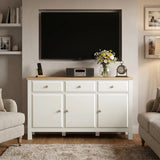 [White] Haven 3-door sideboard angled view in a styled room with decorative accessories on oak veneer top