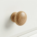 [White] Haven 3-drawer chest close-up of a single round solid oak wooden knob handle on a painted drawer front