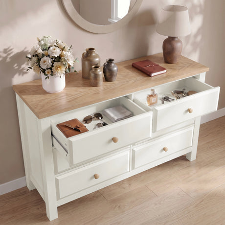 [White] Haven 6-drawer chest with top-left and middle-right drawers open showing folded knits inside