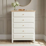 [White] Haven 5-drawer tall chest front view with decorative tray and small objects arranged on oak veneer top