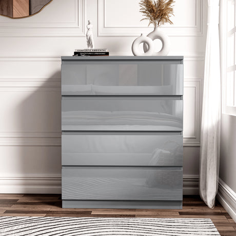 [Grey] 4 drawer chest in grey gloss finish, shown against white wainscot wall with figurine on top