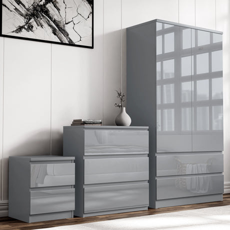[Grey] high gloss wardrobe with lower drawers, chest of drawers and bedside table arranged on light timber floor