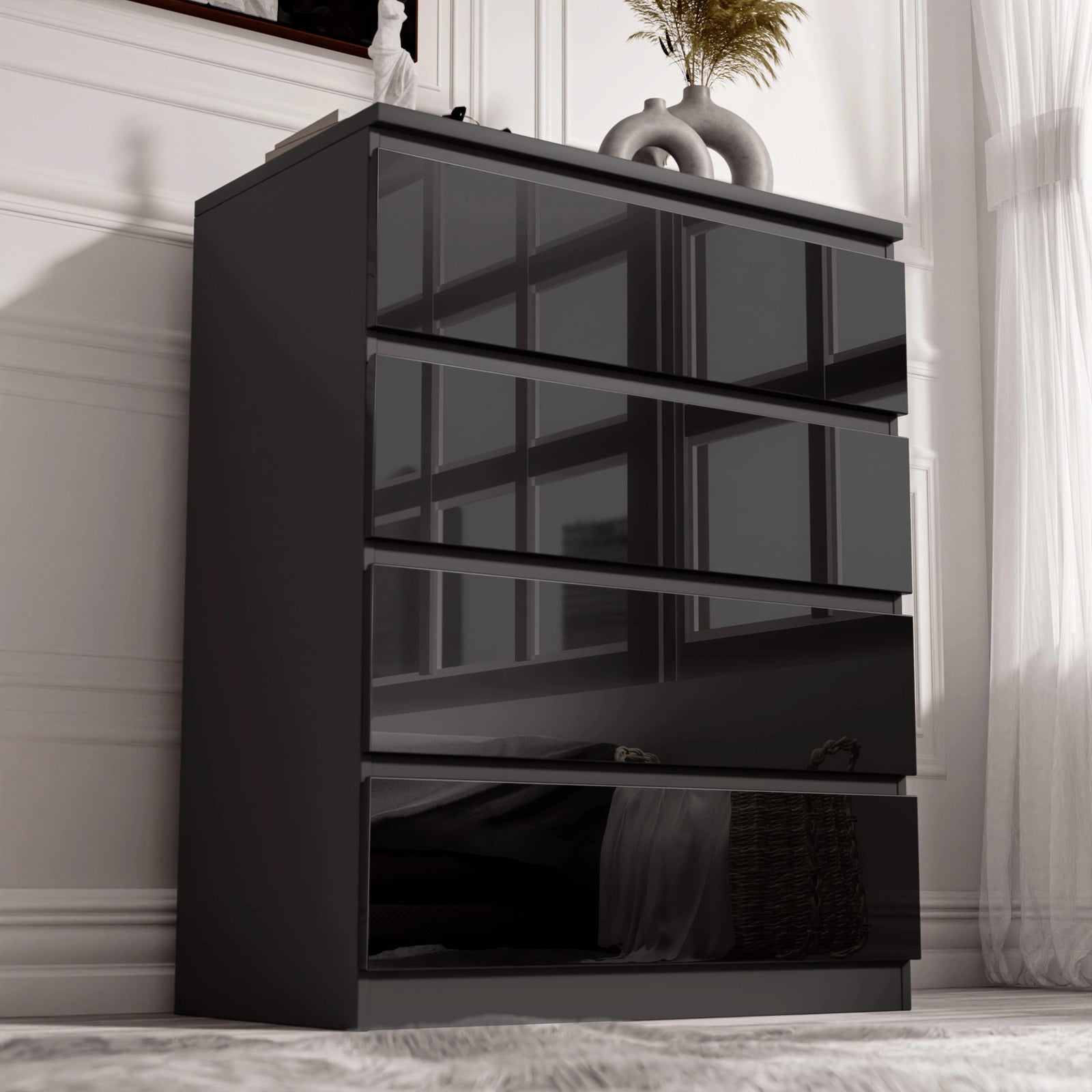 [Black] Angled view of the black High Gloss 4 Drawer Chest of Drawers, gloss fronts reflecting window panes vertically.
