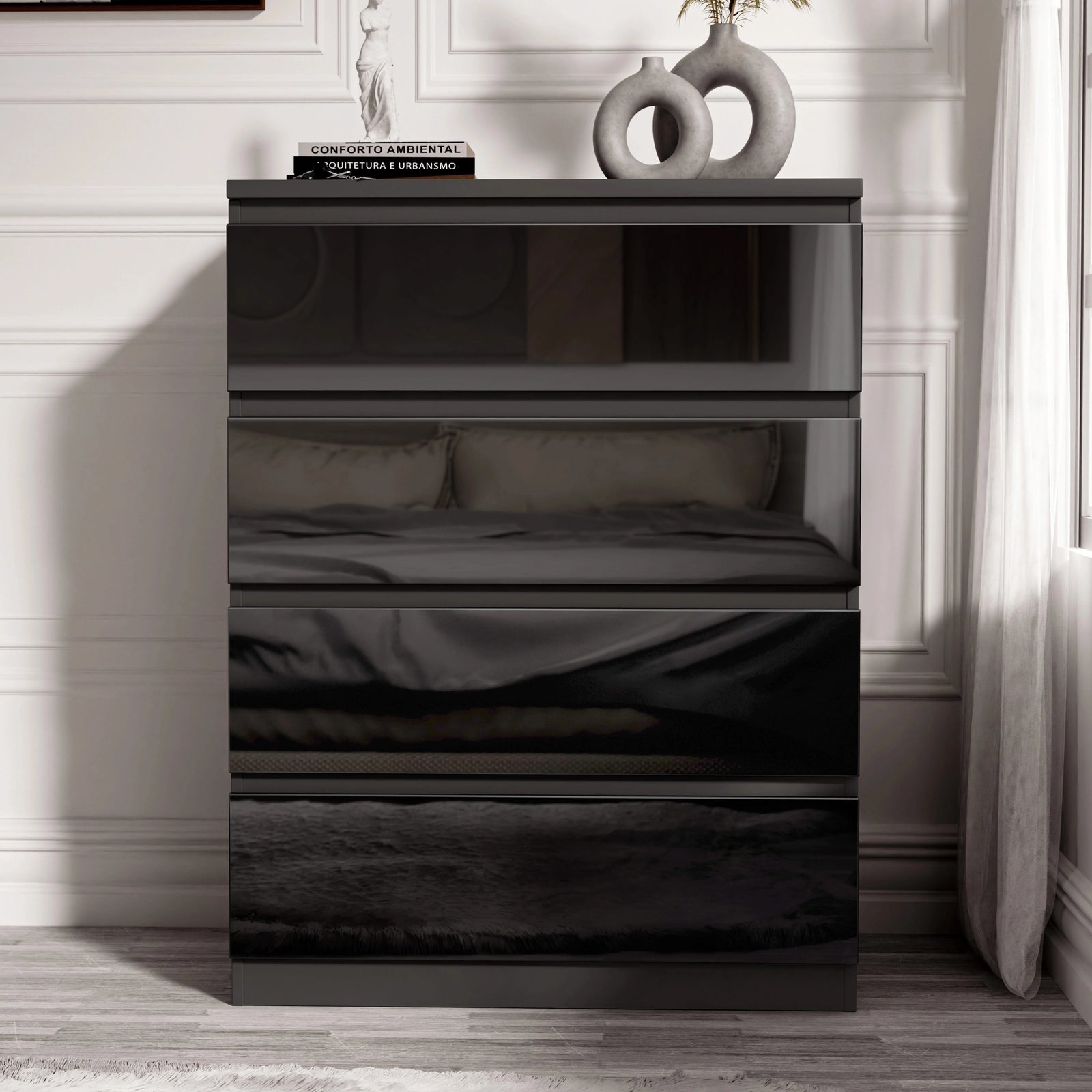 [Black] Black handleless 4 Drawer Chest of Drawers shot head-on against a panelled wall with the bed reflected.