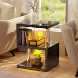 Black high gloss side table with yellow LED lights and 3-tier storage, ideal for contemporary home interiors.