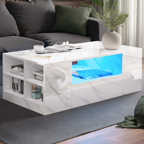 [White Marble] White marble coffee table between dark sofas, blue LED illuminating centre shelf with books on top