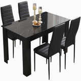 High gloss dining table and chairs set with sleek design, perfect for modern interiors.