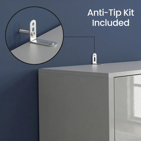 [High Gloss Grey] cabinet with an anti-tip bracket attached, against a blue wall