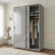 [High Gloss Grey] Torvek sliding wardrobe angled view fully closed with reflective gloss grey doors in blue bedroom