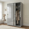 [High Gloss Grey] Torvek sliding wardrobe angled view fully closed with reflective gloss grey doors in blue bedroom