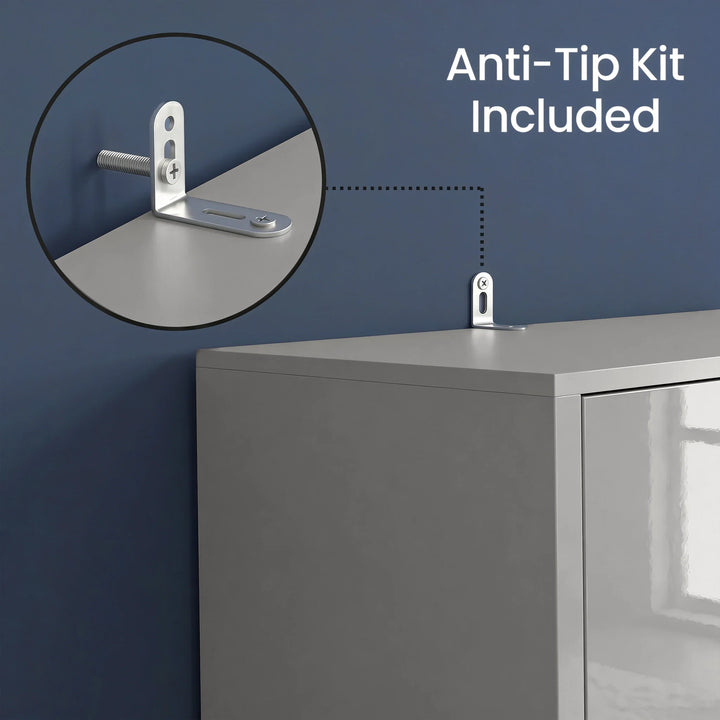 [High Gloss Grey] cabinet with an anti-tip bracket attached, against a blue wall