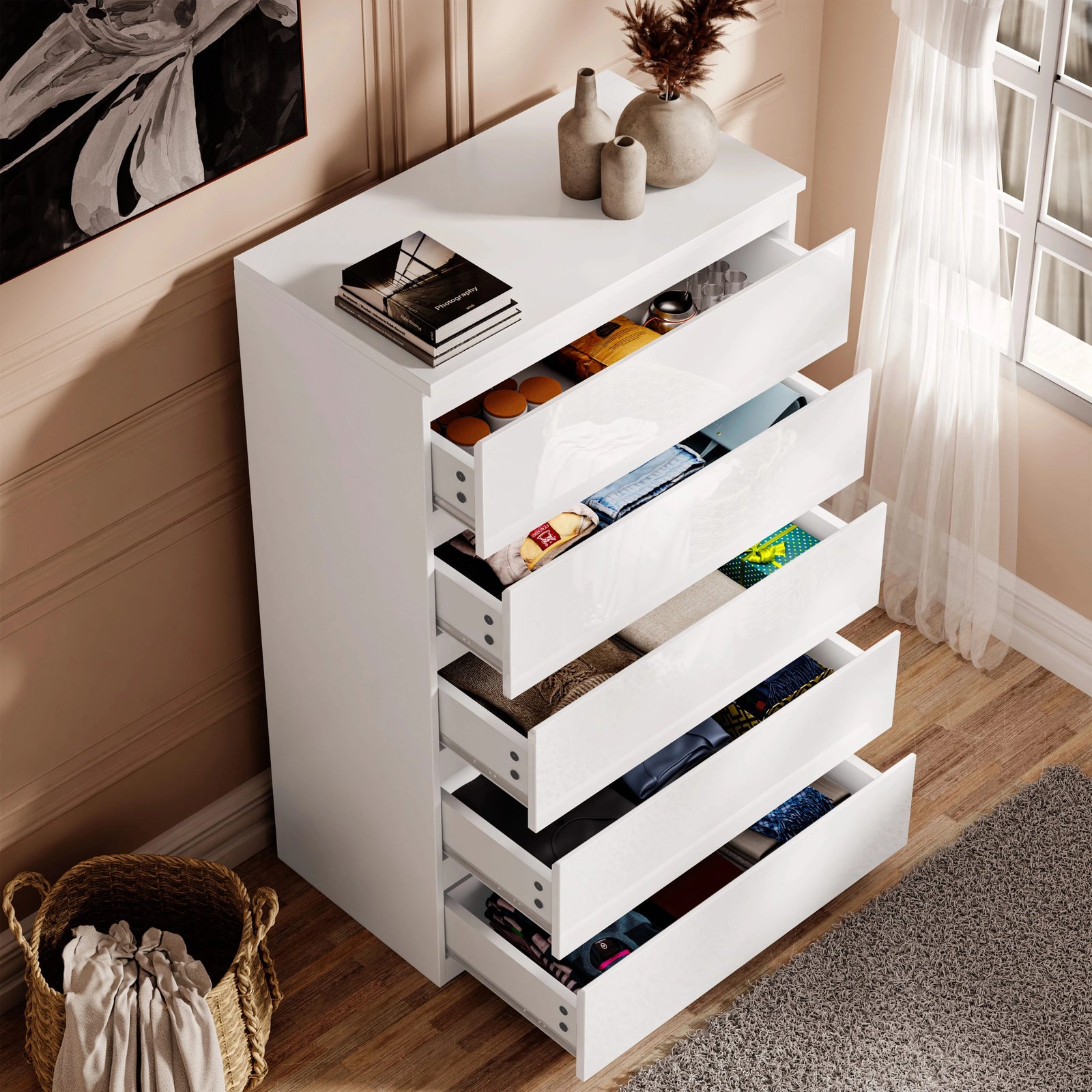 [White] White high gloss tall chest of drawers seen from above with drawers open and woven basket