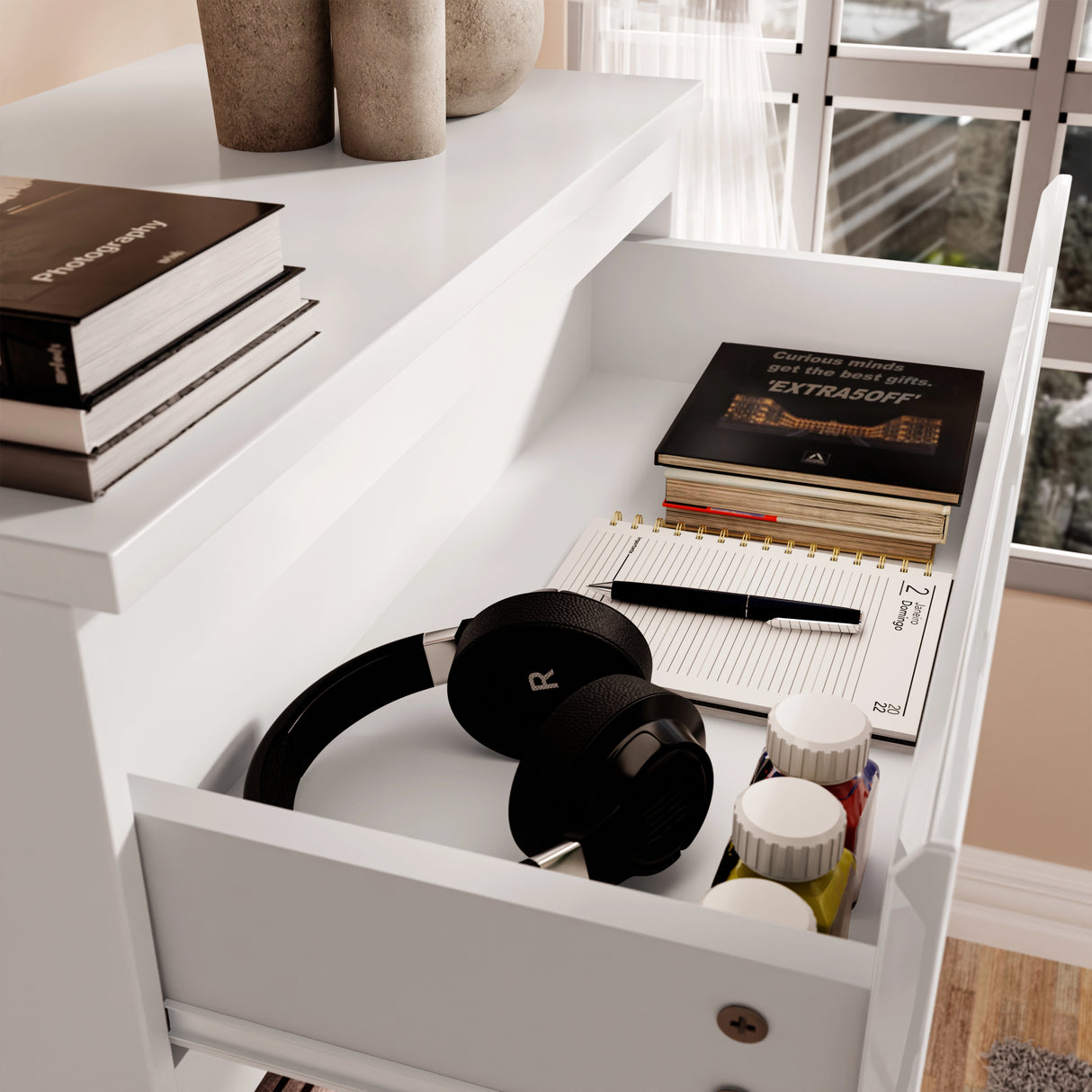 High Gloss Tall Chest of Drawers with open drawer showing headphones, books, and stationery. 5 Drawer Chest Bedroom Drawers ideal for modern storage.