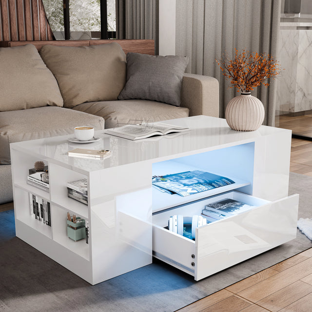 White high gloss coffee table with LED lights, open shelving, and pull-out drawers for modern living room storage and decor.