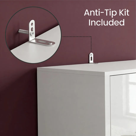 [High Gloss White] Anti-tip kit installation on a piece of furniture with a purple wall background