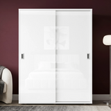 [High Gloss White] sliding wardrobe doors in a room with a dark wall and modern decor