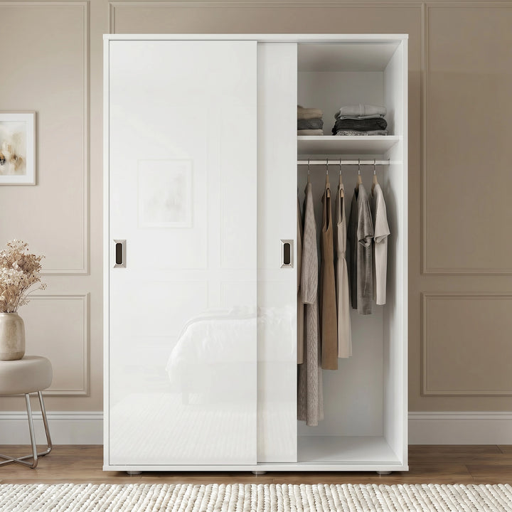 [High Gloss White] Torvek gloss wardrobe one door open showing hanging jackets, folded shelf items and rolled bedding