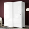 [High Gloss White] Torvek sliding wardrobe angled view fully closed with reflective gloss panel doors in bedroom
