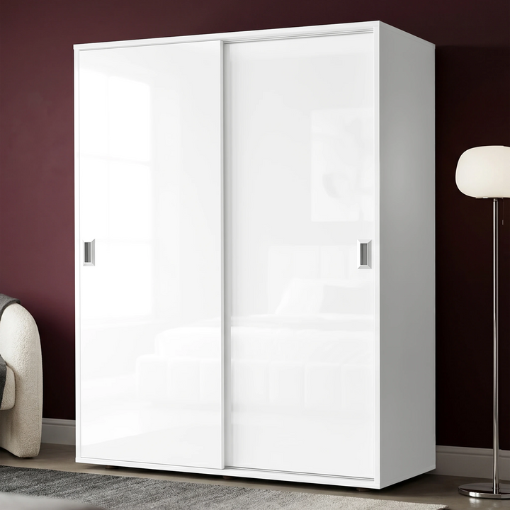 [High Gloss White] Torvek sliding wardrobe angled view fully closed with reflective gloss panel doors in bedroom