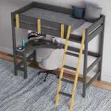 High single bunk bed with desk underneath and wooden ladder placed against a wall on a blue patterned rug