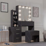 [Black Marble] Three-quarter shot of black marble Hollywood mirror dressing table, silver bar handles on drawers