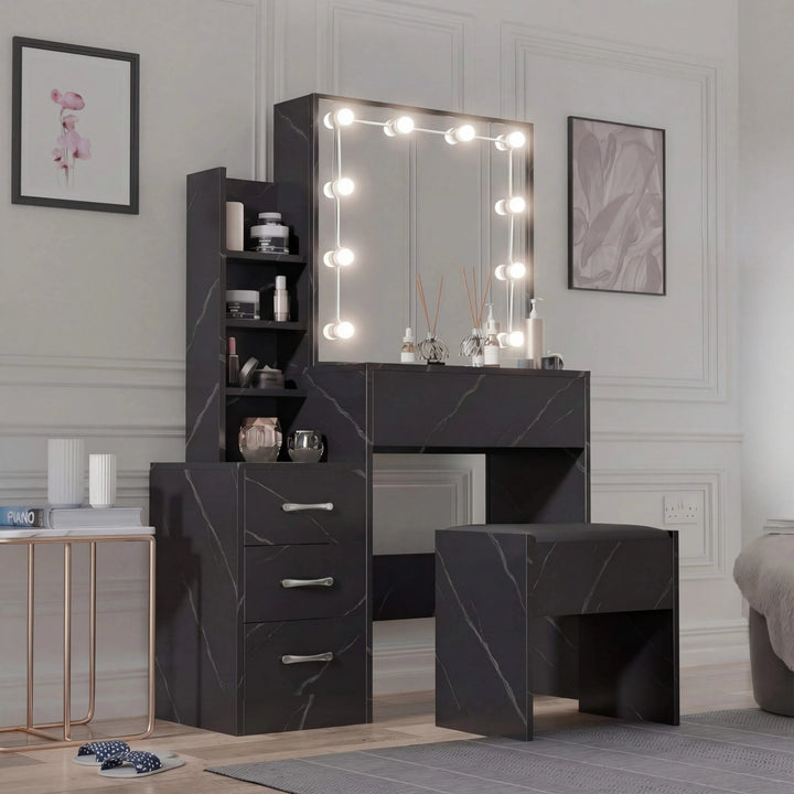 [Black Marble] Three-quarter shot of black marble Hollywood mirror dressing table, silver bar handles on drawers