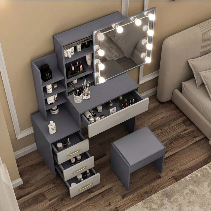 [Grey + Silver Grey] Overhead view of grey and silver grey Hollywood mirror dressing table with open desktop drawer