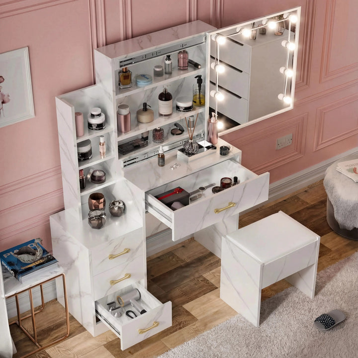 [White Marble] Top-down shot of white marble Hollywood mirror dressing table, LED bulbs visible around the mirror frame