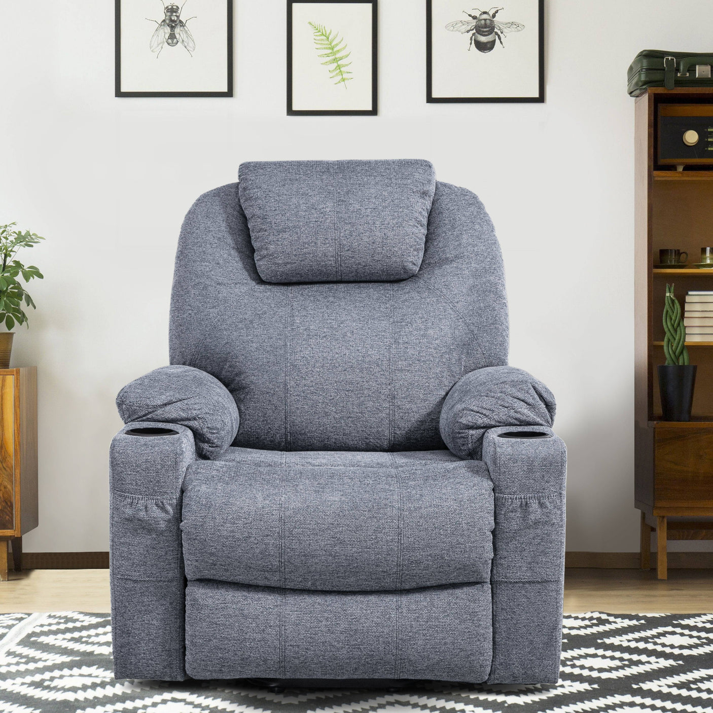 Front view of grey riser recliner chair with plush cushioning and cup holders, perfect for living room relaxation.
