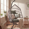 Stylish indoor egg chair with a metal stand, offering cozy seating for modern interiors with a comfortable cushion.