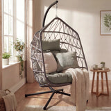 Stylish indoor egg chair with a metal stand, offering cozy seating for modern interiors with a comfortable cushion.