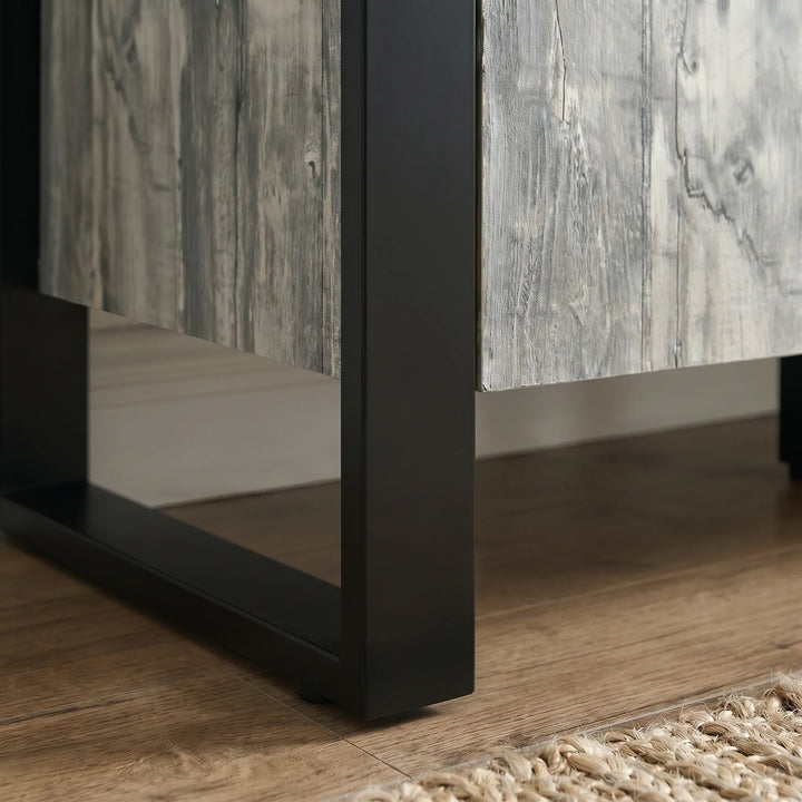 [Grey] Ironmere sideboard side frame close-up with black metal support beside the door panel