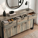 [Smokey Oak] Ironmere sideboard top surface angled view with bowls and tray above the three drawer fronts