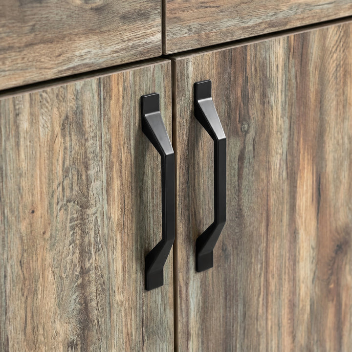 [Smokey Oak] Ironmere sideboard handle detail showing two black pulls on grain-patterned cupboard doors