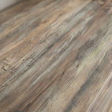 [Smokey Oak] Ironmere sideboard side frame close-up with black metal support beside the door panel