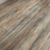 [Smokey Oak] Ironmere sideboard side frame close-up with black metal support beside the door panel