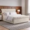 [King | Beige] Angled bedroom view with tufted headboard, rolled footboard, white bedding, lamps, wood panels, and window