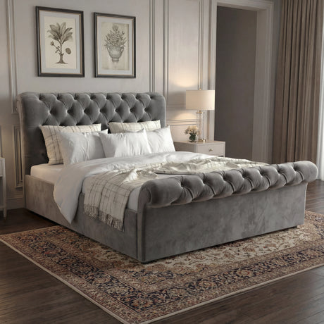 Side view of king size dark grey chesterfield ottoman bed with tufted headboard and elegant frame