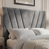 Close-up view of the dark grey ottoman bed’s headboard, highlighting the elegant padded and v-shaped design