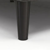 [King | Grey] Velvet Bed Frame close-up of tapered dark cylindrical leg on plain background