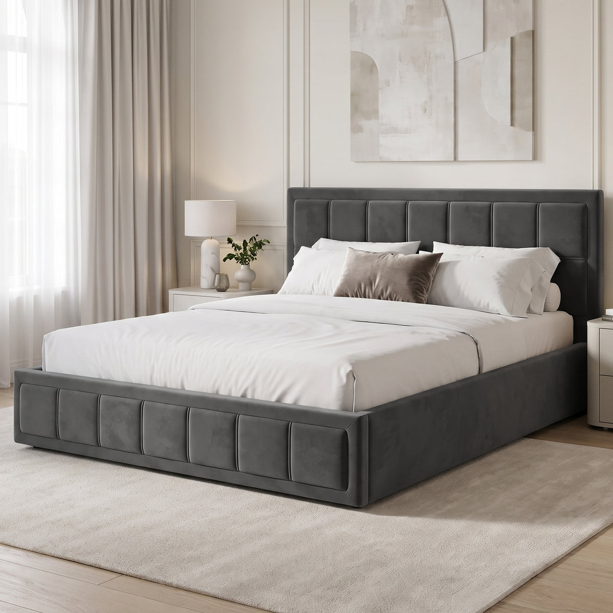 [King | Grey] Angled bedroom view of velvet end lift ottoman bed beside nightstands and lamps under wall artwork