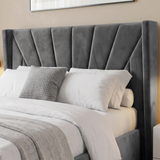 [King | Dark Grey] upholstered wingback bed headboard with vertical channel tufting, shown with white bedding, white pillows, and a textured gray accent pillow in a bedroom setting.
