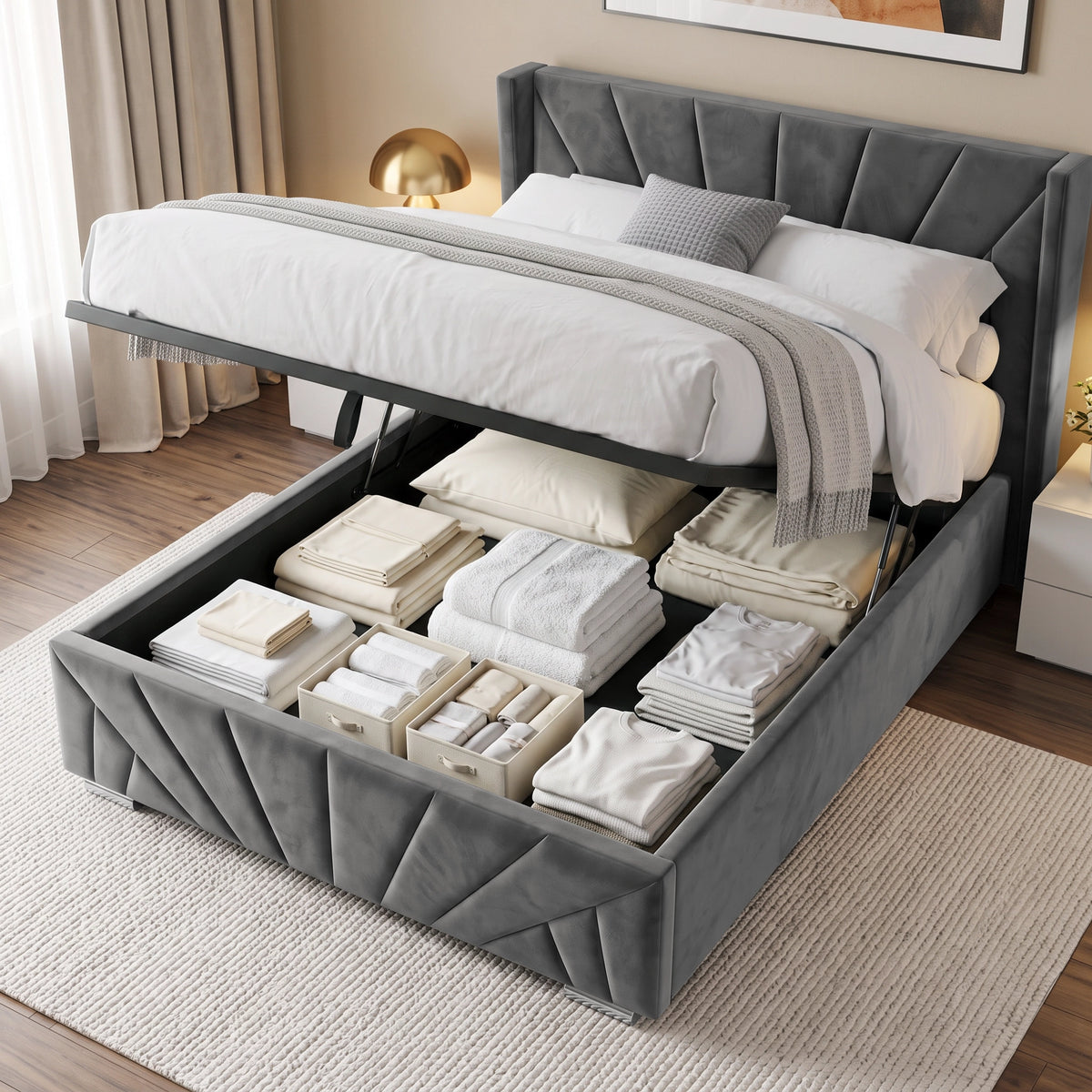 [King | Dark Grey] upholstered lift-up bed frame shown open in a styled bedroom, with white bedding on top and storage compartments underneath filled with folded towels and linens.