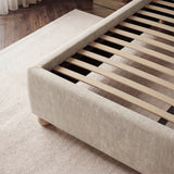 Close view of evenly spaced wooden slats designed to distribute mattress weight with beige upholstered footboard